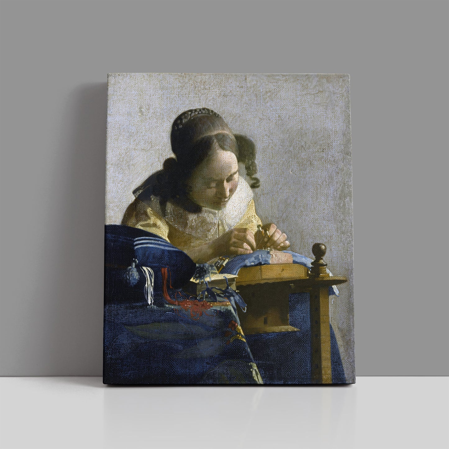The Lacemaker (1669) – Johannes Vermeer